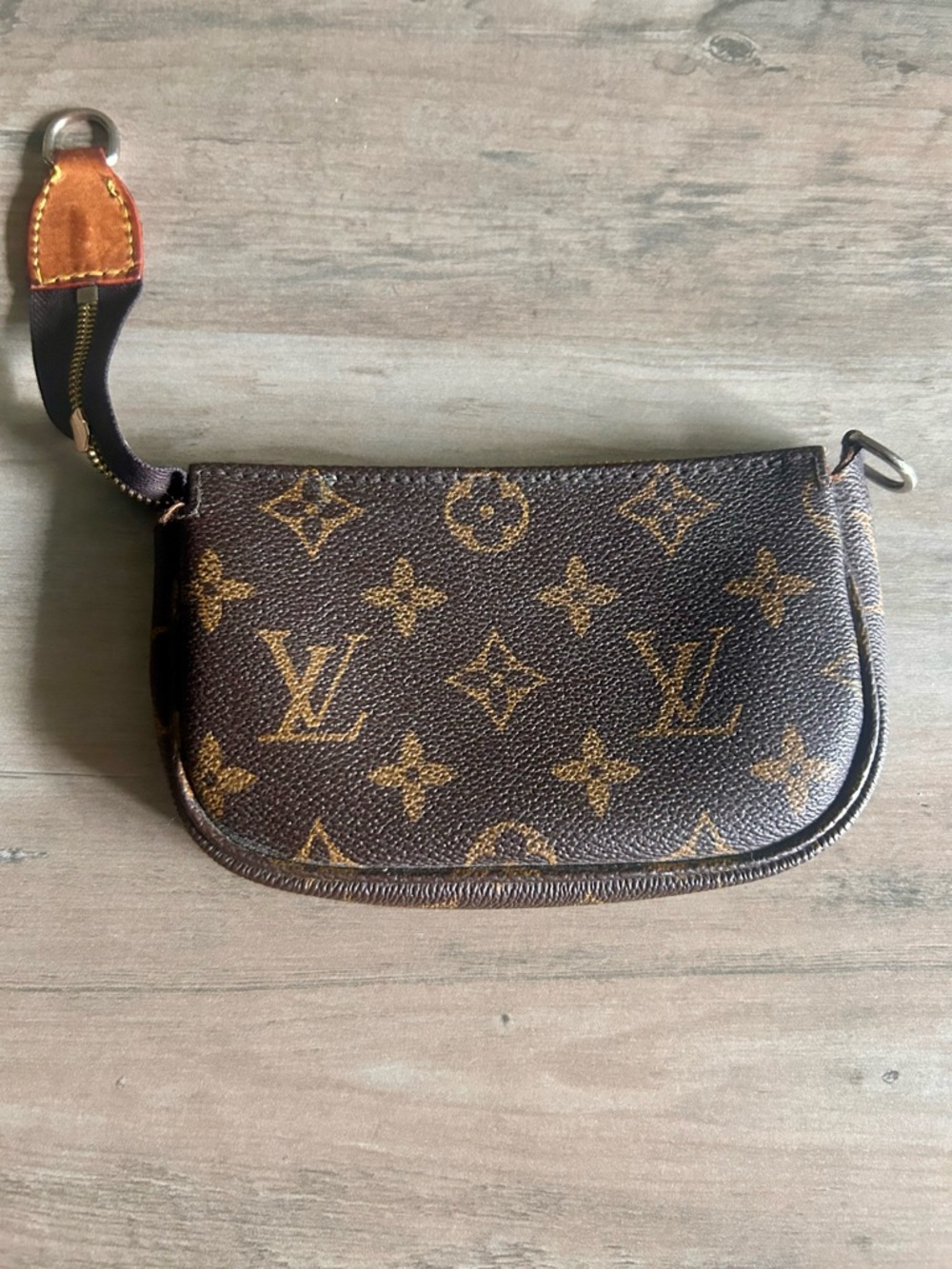Louis Vuitton Monogram Mini Accessory
Pochette Pouch